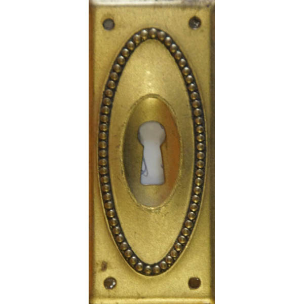 Schlüsselschild, Originalbeschlag, Messing patiniert, aus Blech gestanzt und geprägt.