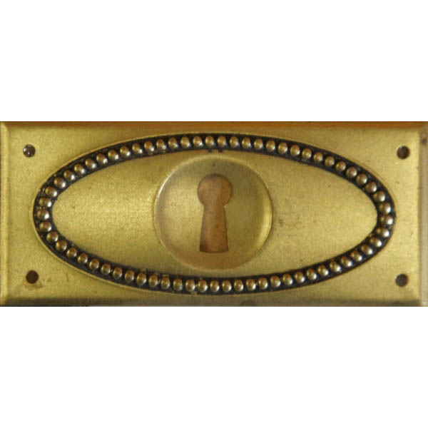 Schlüsselschild, Originalbeschlag, Messing patiniert, aus Blech gestanzt und geprägt.